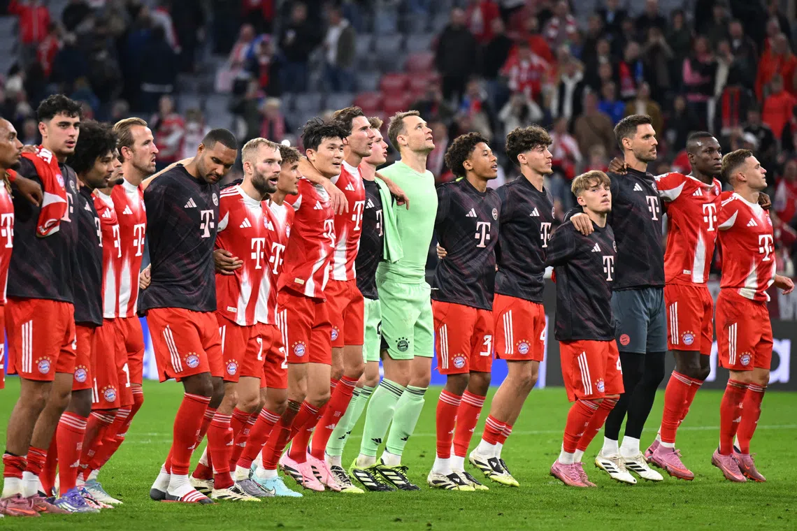Soccer Football - UEFA Champions League - Bayern Munich v Chelsea - Allianz Arena, Munich, Germany - September 17, 2025 Bayern Munich players celebrate after the match REUTERS/Angelika Warmuth