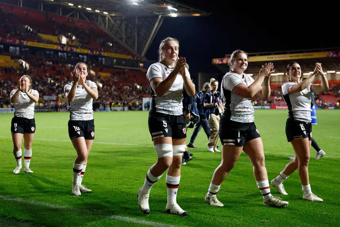 FILE PHOTO: Rugby - Women's World Cup 2025 - Semi Finals - New Zealand v Canada - Ashton Gate, Bristol, Britain - September 19, 2025 Canada's Courtney O'Donnell celebrates after the match with team mates Action Images via Reuters/Peter Cziborra/File Photo