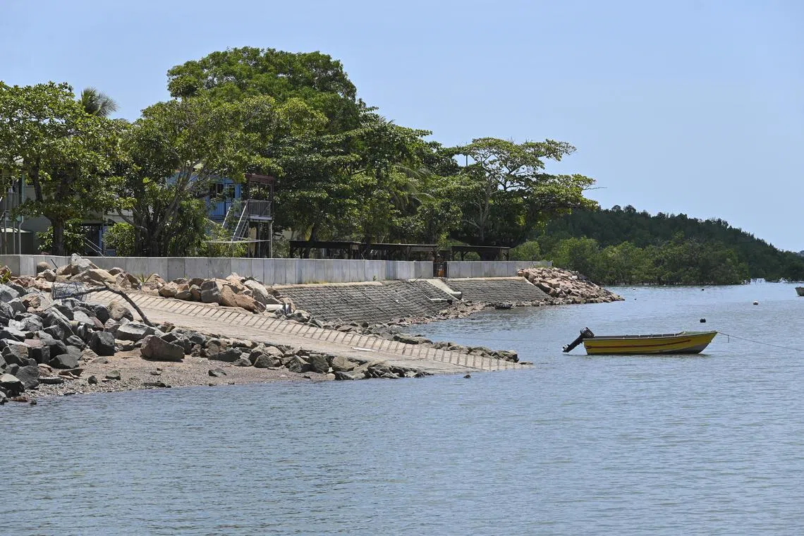 This handout photo taken on October 21, 2021 and received on October 26 from the Grata Fund shows a seawall on Boigu Island in Australia's Torres Strait. Indigenous residents of low-lying islands off northern Australia filed a landmark lawsuit on October 26, 2021 aimed at forcing the government to protect them from climate change through deeper cuts to carbon emissions. (Photo by TALEI ELU / GRATA FUND / AFP) / ----EDITORS NOTE ----RESTRICTED TO EDITORIAL USE MANDATORY CREDIT " AFP PHOTO / TALEI ELU / GRATA FUND" NO MARKETING NO ADVERTISING CAMPAIGNS - DISTRIBUTED AS A SERVICE TO CLIENTS