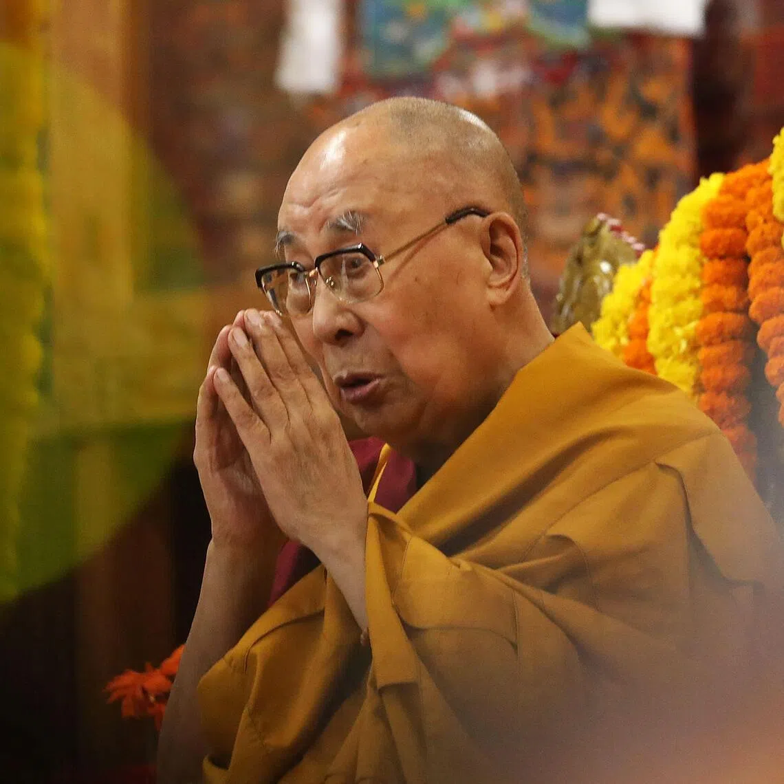 The Dalai Lama says he is praying for all those killed in devastating floods that left hundreds dead in Nepal and Tibet.