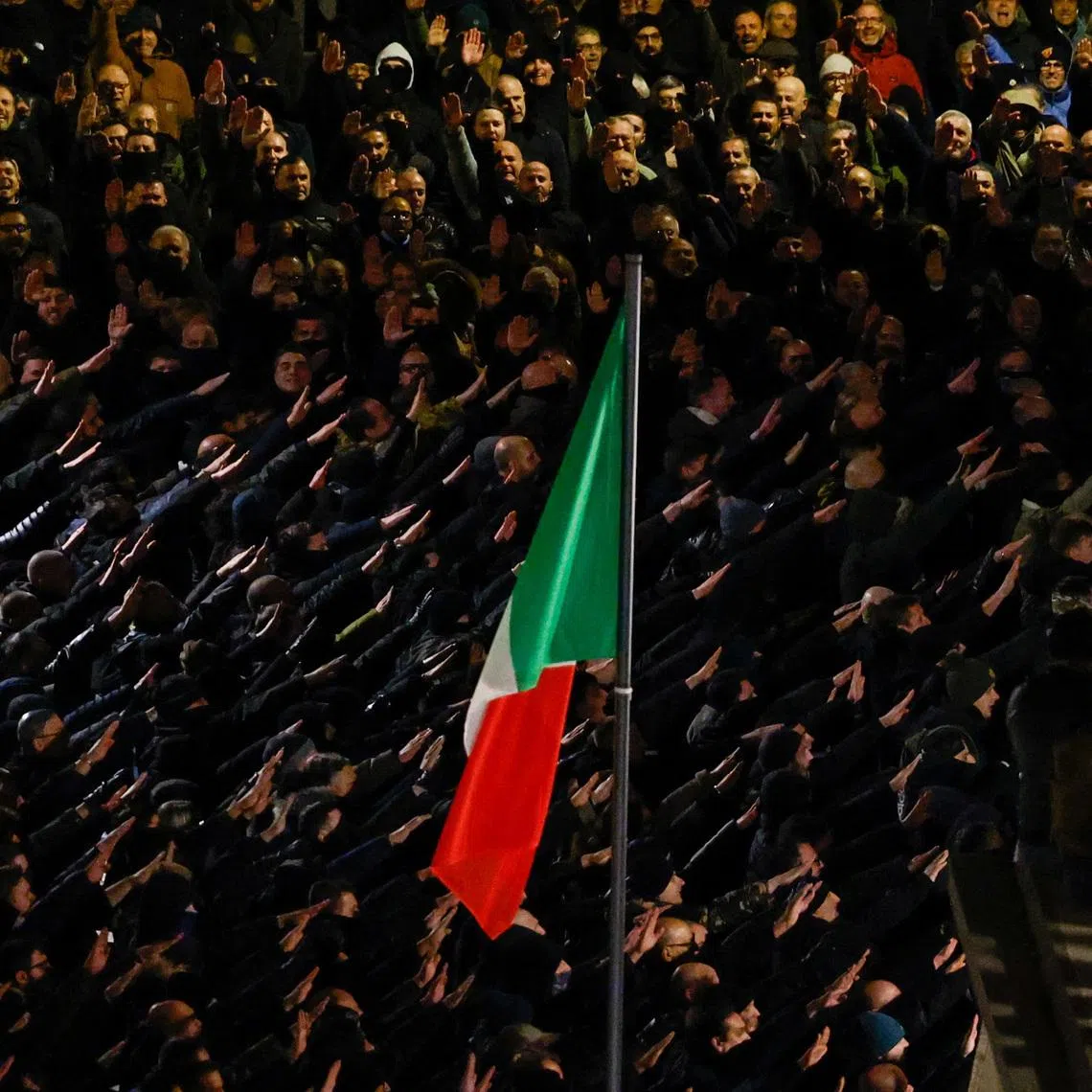 Neo-fascists gesture during a commemoration of the Acca Larentia anniversary, an event marking the killings of two far-right activists, that took place on January 7, 1978, in Rome, Italy January 7, 2026. REUTERS/Matteo Minnella