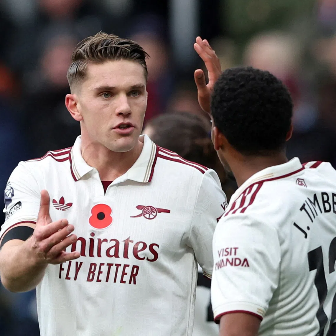 FILE PHOTO: Soccer Football - Premier League - Burnley v Arsenal - Turf Moor, Burnley, Britain - November 1, 2025 Arsenal's Viktor Gyokeres celebrates scoring their first goal with Jurrien Timber REUTERS/Scott Heppell EDITORIAL USE ONLY. NO USE WITH UNAUTHORIZED AUDIO, VIDEO, DATA, FIXTURE LISTS, CLUB/LEAGUE LOGOS OR 'LIVE' SERVICES. ONLINE IN-MATCH USE LIMITED TO 120 IMAGES, NO VIDEO EMULATION. NO USE IN BETTING, GAMES OR SINGLE CLUB/LEAGUE/PLAYER PUBLICATIONS. PLEASE CONTACT YOUR ACCOUNT REPRESENTATIVE FOR FURTHER DETAILS../File Photo