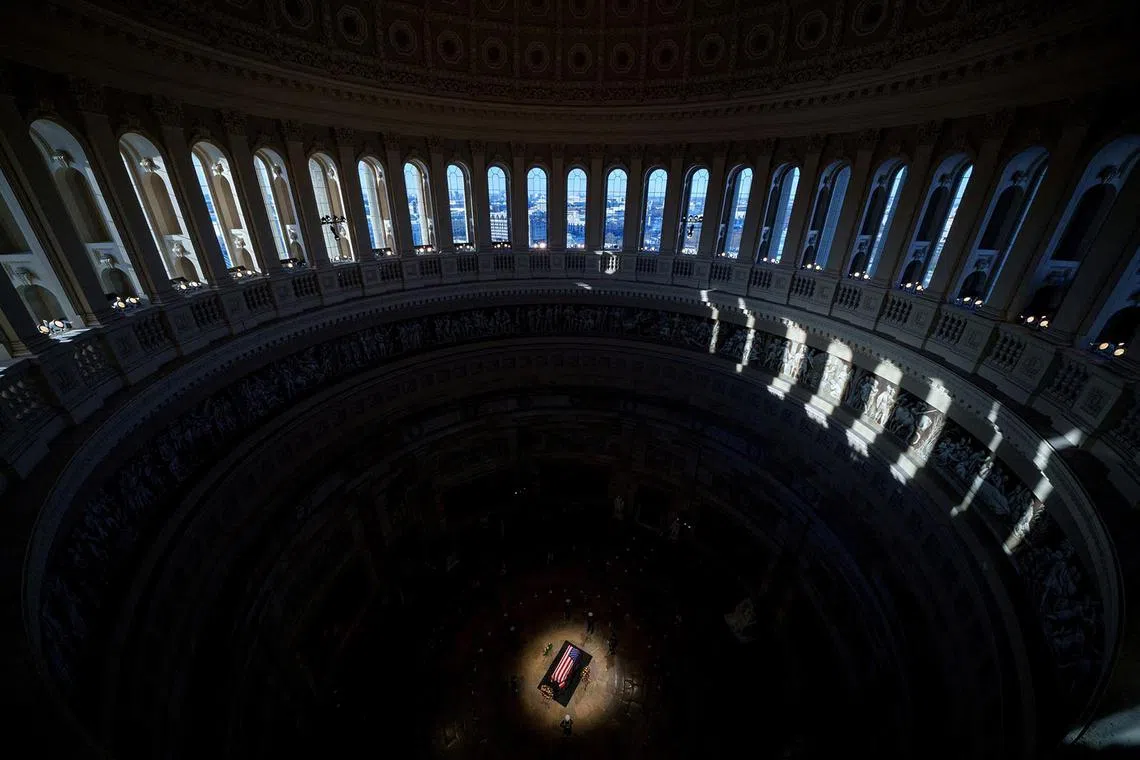 The flag-draped casket of former U.S. President Jimmy Carter lies in state in the U.S. Capitol Rotunda, in Washington, DC, U.S., January 8, 2025. Andrew Harnik/Pool via REUTERS TPX IMAGES OF THE DAY