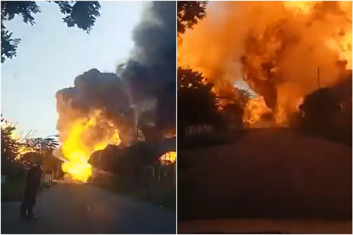 The blast destroyed two houses and several cars, and injured bystanders.