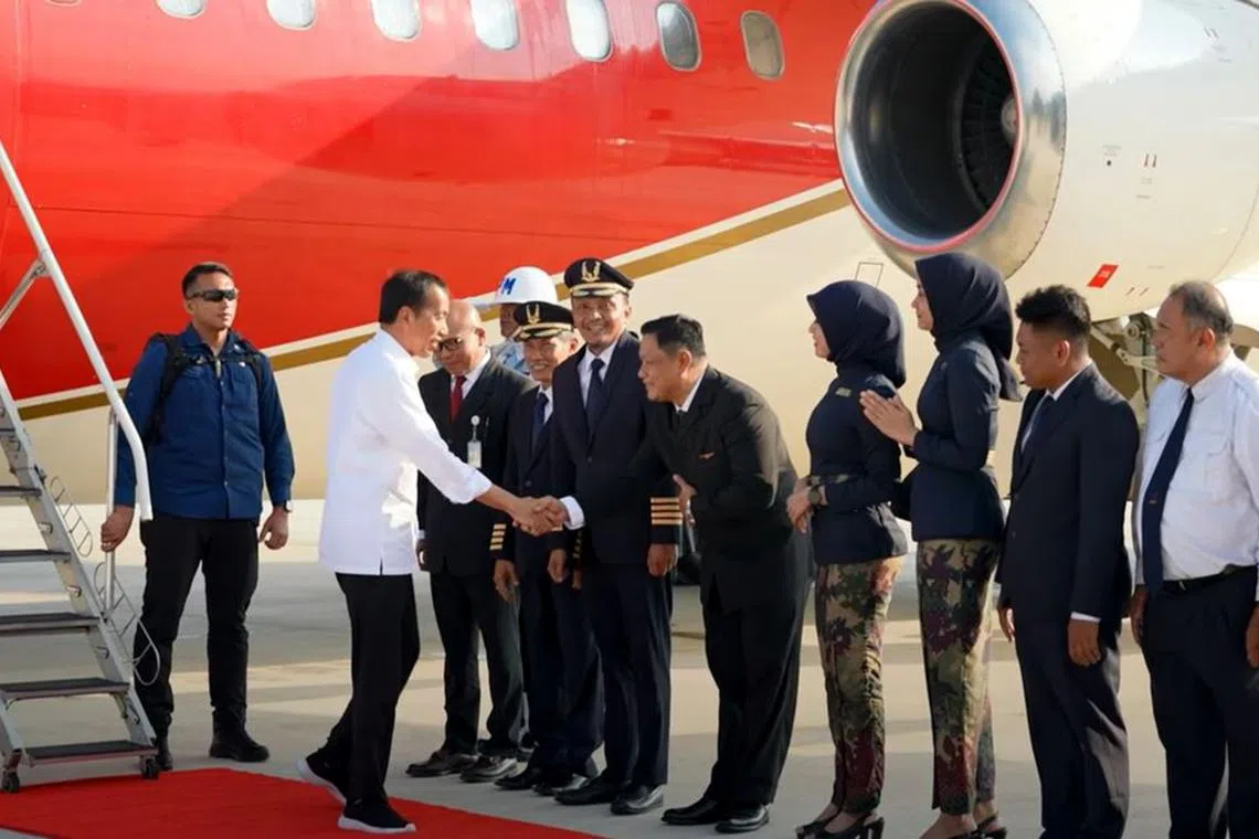 Indonesian President Joko Widodo arrives at the airport in Nusantara, Indonesia's new capital city, on Sept 24.