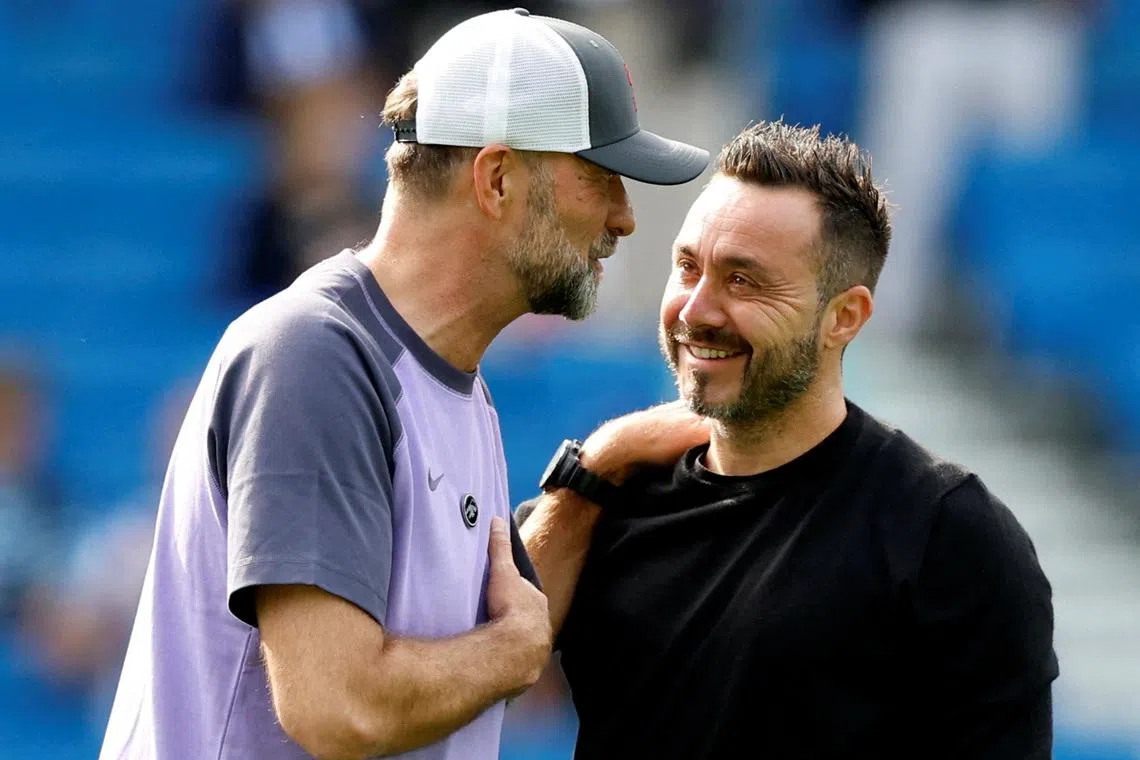 Soccer Football - Premier League - Brighton & Hove Albion v Liverpool - The American Express Community Stadium, Brighton, Britain - October 8, 2023 Liverpool manager Juergen Klopp with Brighton & Hove Albion manager Roberto De Zerbi before the match Action Images via Reuters/Peter Cziborra/File Photo