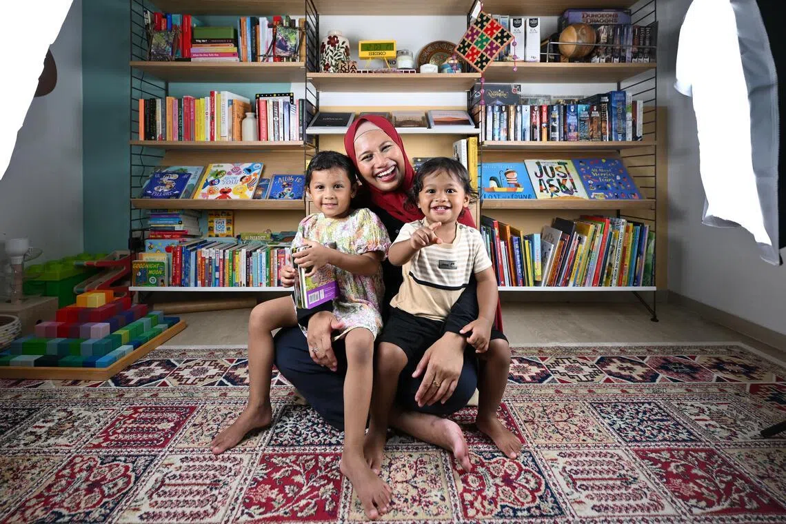 The Mum Collective SG founder Nurulhuda Mohamd Rasid with her daughter Naeema Taufiq, (left) four, and son Kareem Taufiq, 22 months, at home.