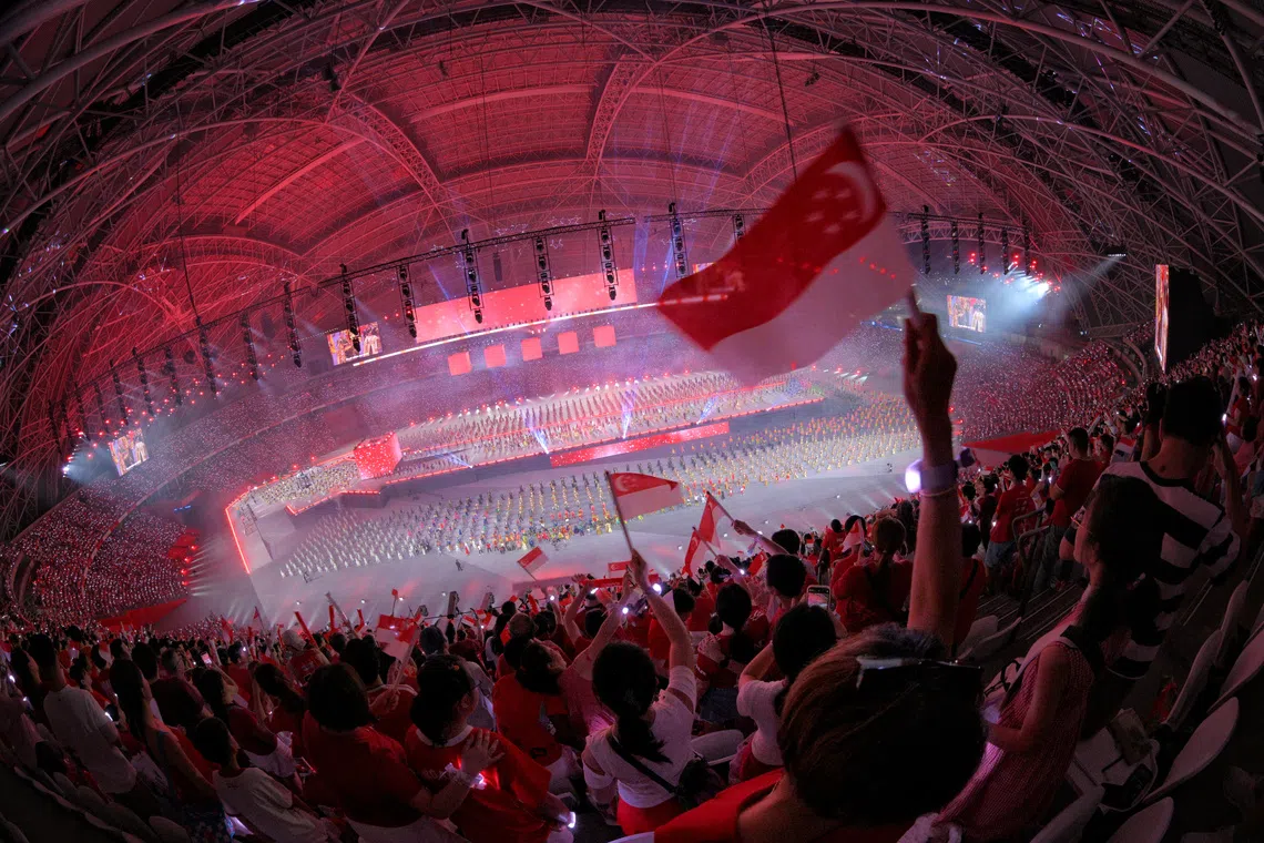 Spectators during the final segment of the National Day Parade 2026 at the National Stadium on Aug 9, 2026.