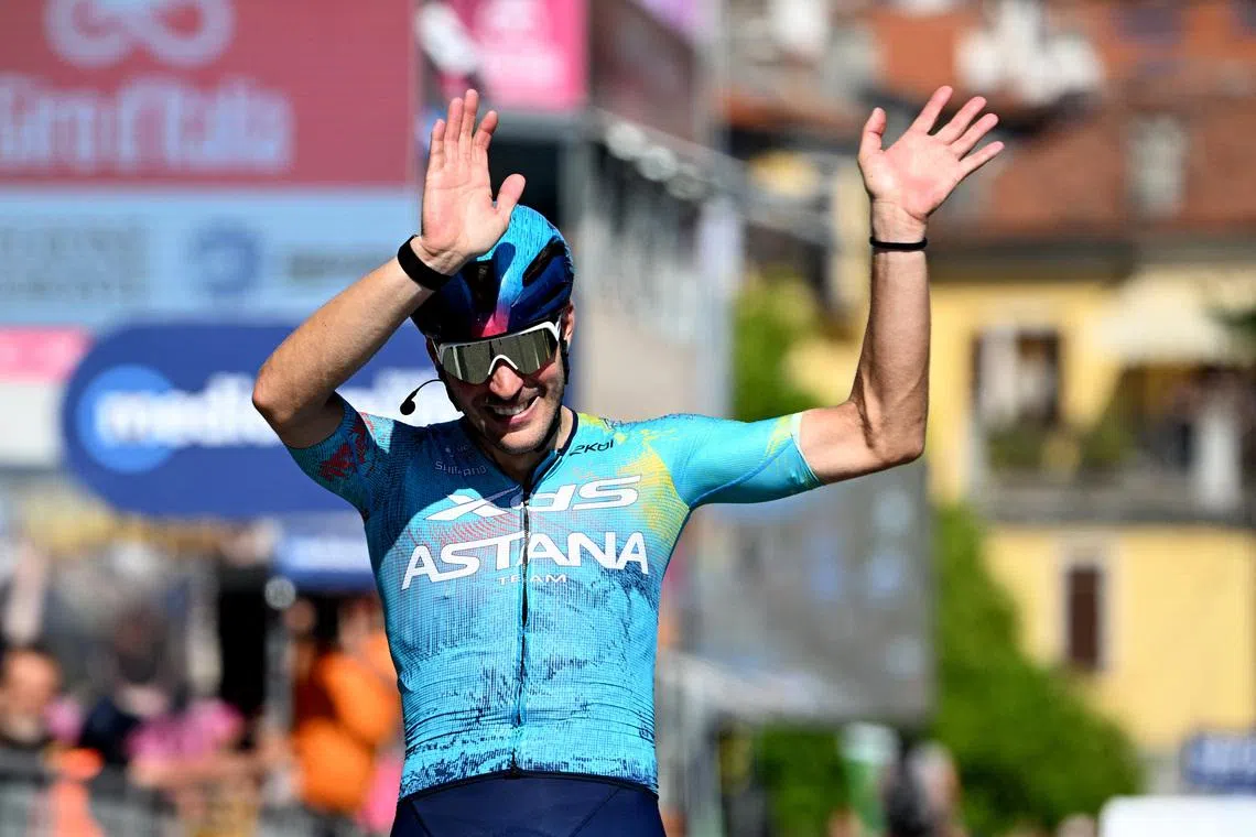 Cycling - Giro d'Italia - Stage 13 - Alessandria to Verbania - Italy - May 22, 2026 XDS Astana Team's Alberto Bettiol celebrates winning stage 13 REUTERS/Jennifer Lorenzini