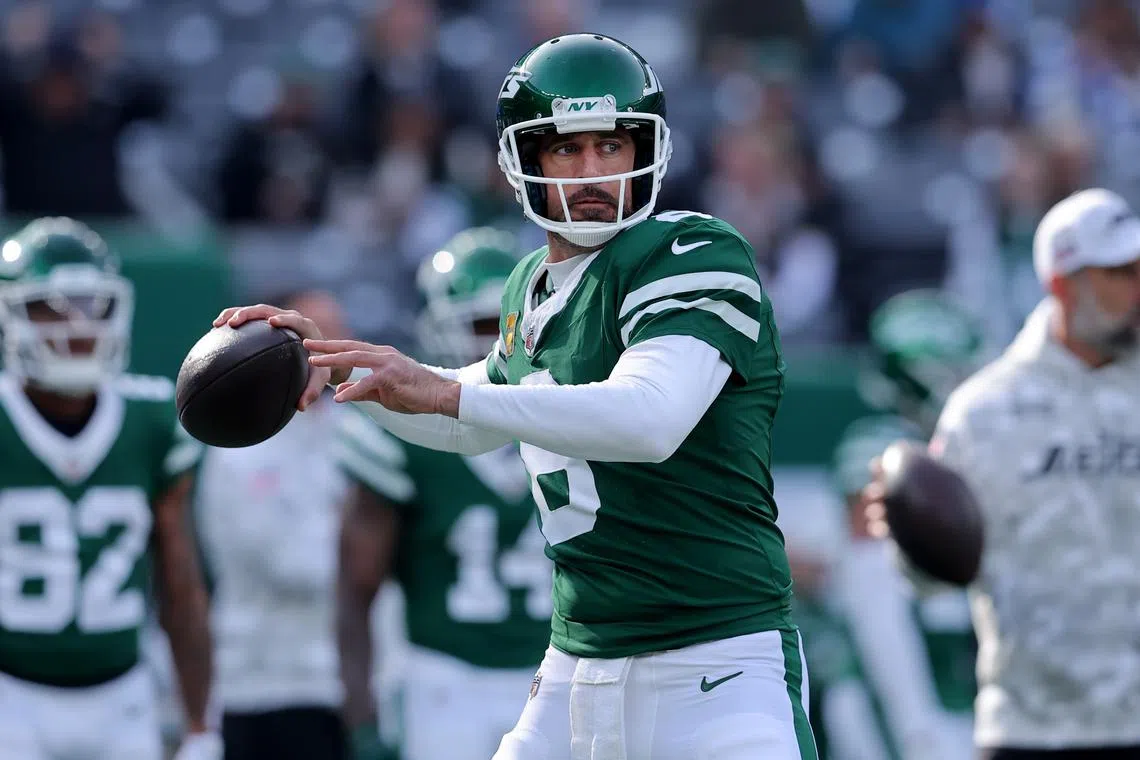 FILE PHOTO: Nov 17, 2024; East Rutherford, New Jersey, USA; New York Jets quarterback Aaron Rodgers (8) warms up before a game against the Indianapolis Colts at MetLife Stadium. Mandatory Credit: Brad Penner-Imagn Images/File Photo