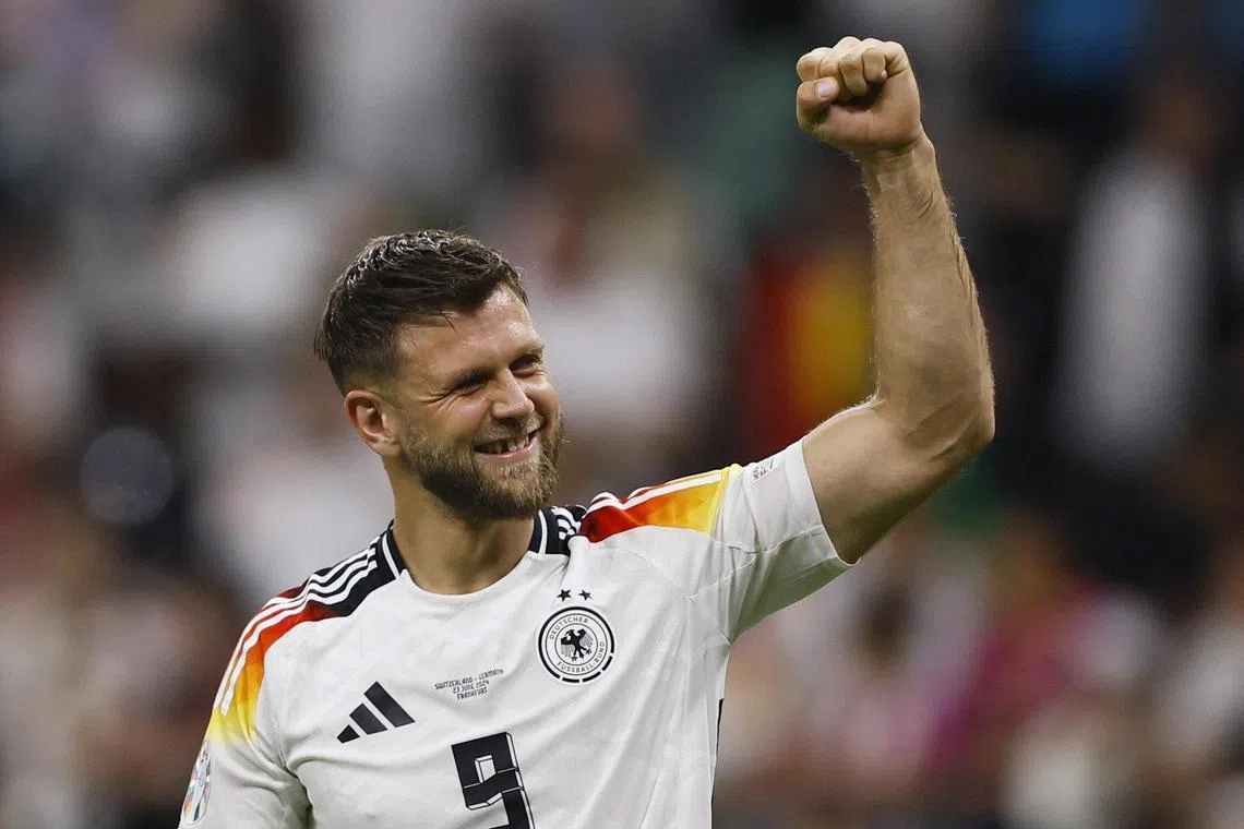 Germany's Niclas Fullkrug (above) could lead the attack against Denmark, as coach Julian Nagelsmann mulls over whether to drop Kai Havertz.