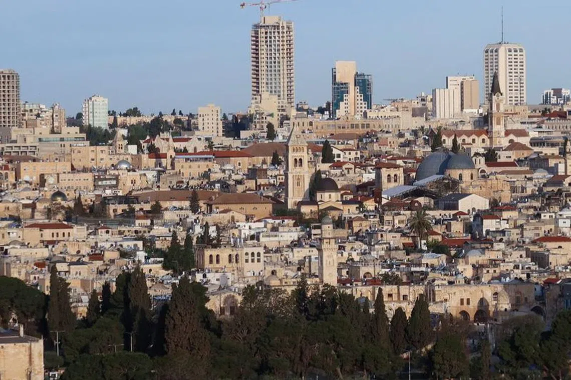 A view from the Mount of Olives shows the Church of the Holy Sepulchre, in Jerusalem's Old City, April 15, 2023. REUTERS/Mustafa Abu Ganeyeh