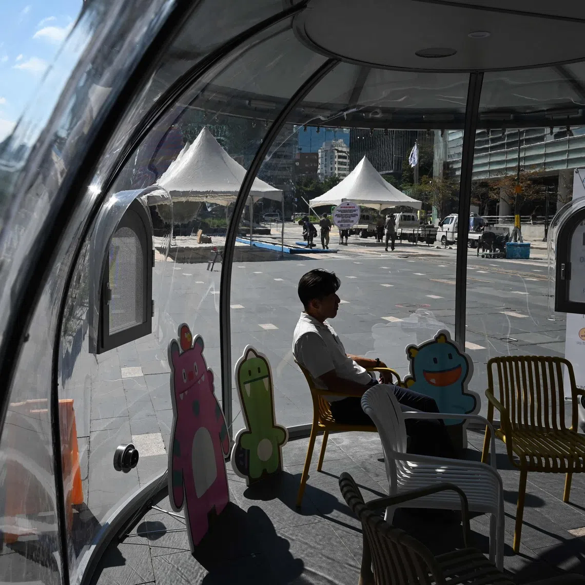 A temporary air-conditioned shelter in Seoul. Temperatures in parts of Seoul surpassed 40 deg C on Aug 7 for the first time in eight years.