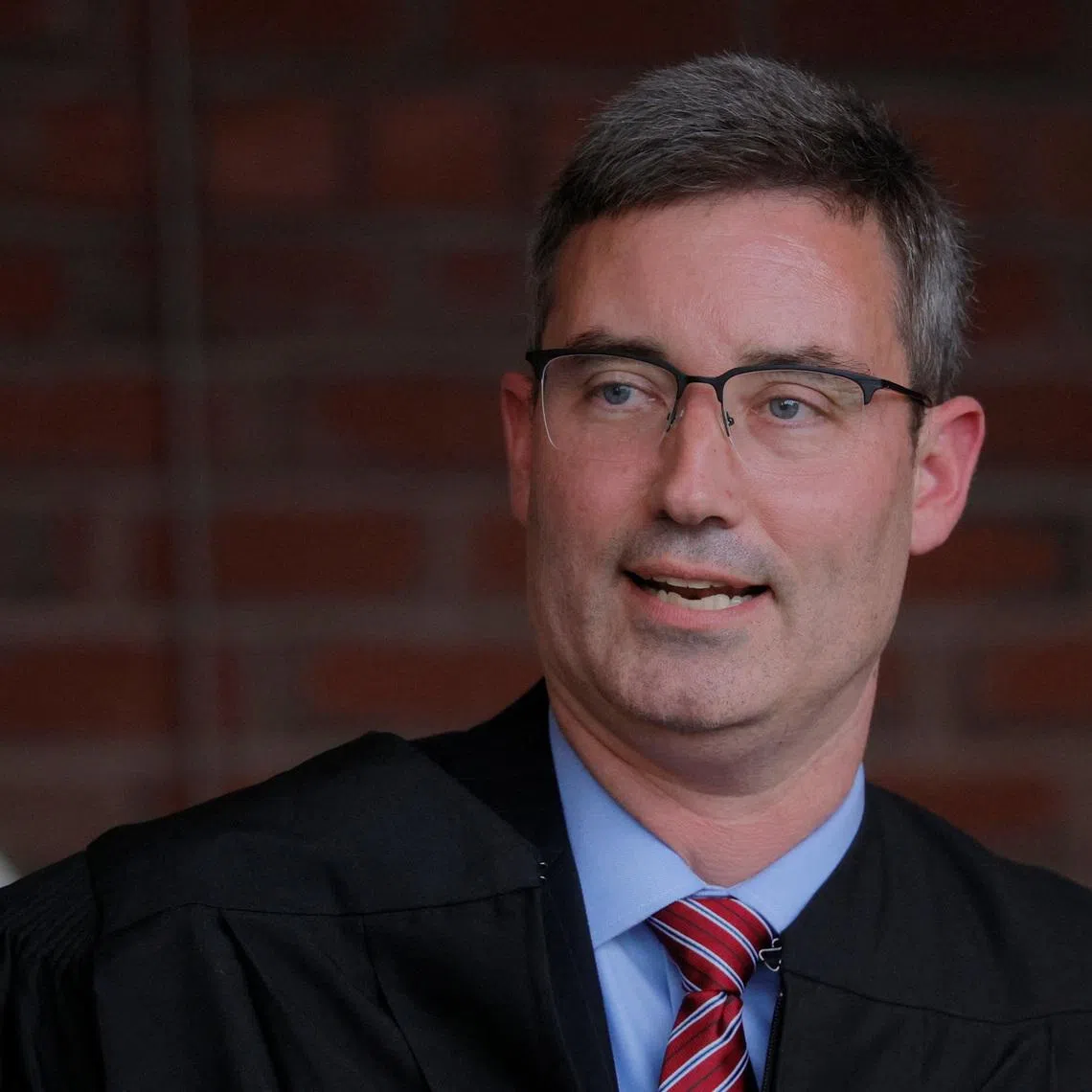 New U.S. District Judge Brian Murphy, who blocked the Trump administration for weeks from finalizing the deportation of eight men to South Sudan, speaks during his Investiture Ceremony at the federal courthouse in Boston, Massachusetts, U.S., September 17, 2025.   REUTERS/Brian Snyder