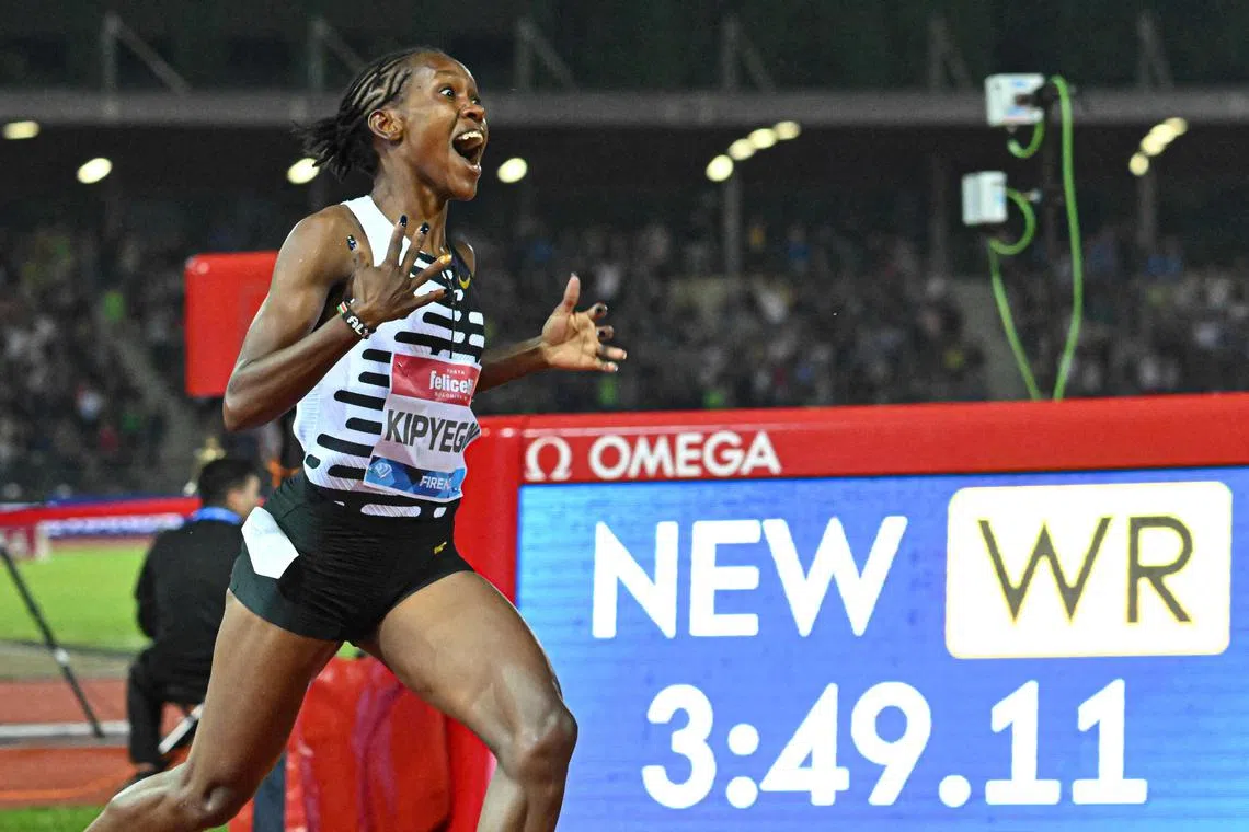 Kenya's Faith Kipyegon reacting as she wins the women's 1,500m event, setting a new world record of 3:49.11, during the Wanda Diamond League 2023 Golden Gala on Friday at the Ridolfi stadium in Florence, Tuscany.