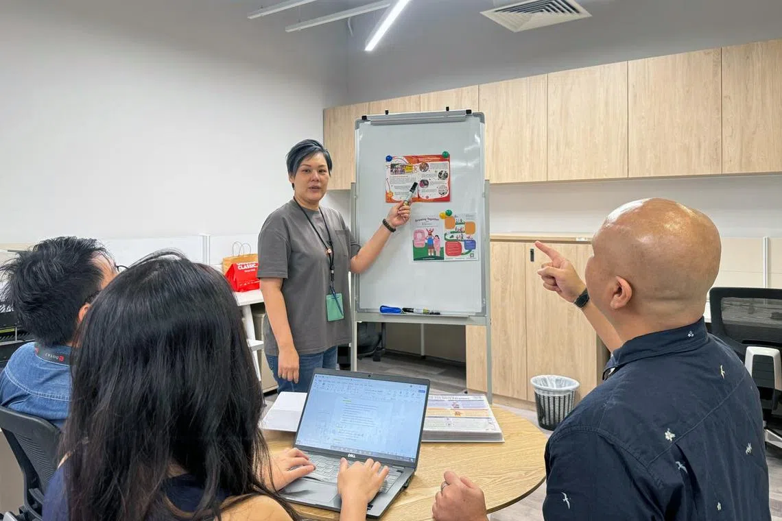 msf family coach discuss financial assistance available for low income families in singapore