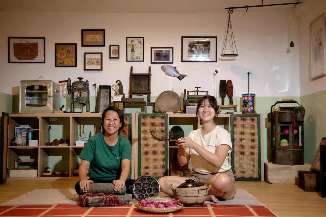 Museum Of Food co-founders (from left) Emily Yeo and Yeo Min in their cooking studio and exhibition space in Joo Chiat Road. 