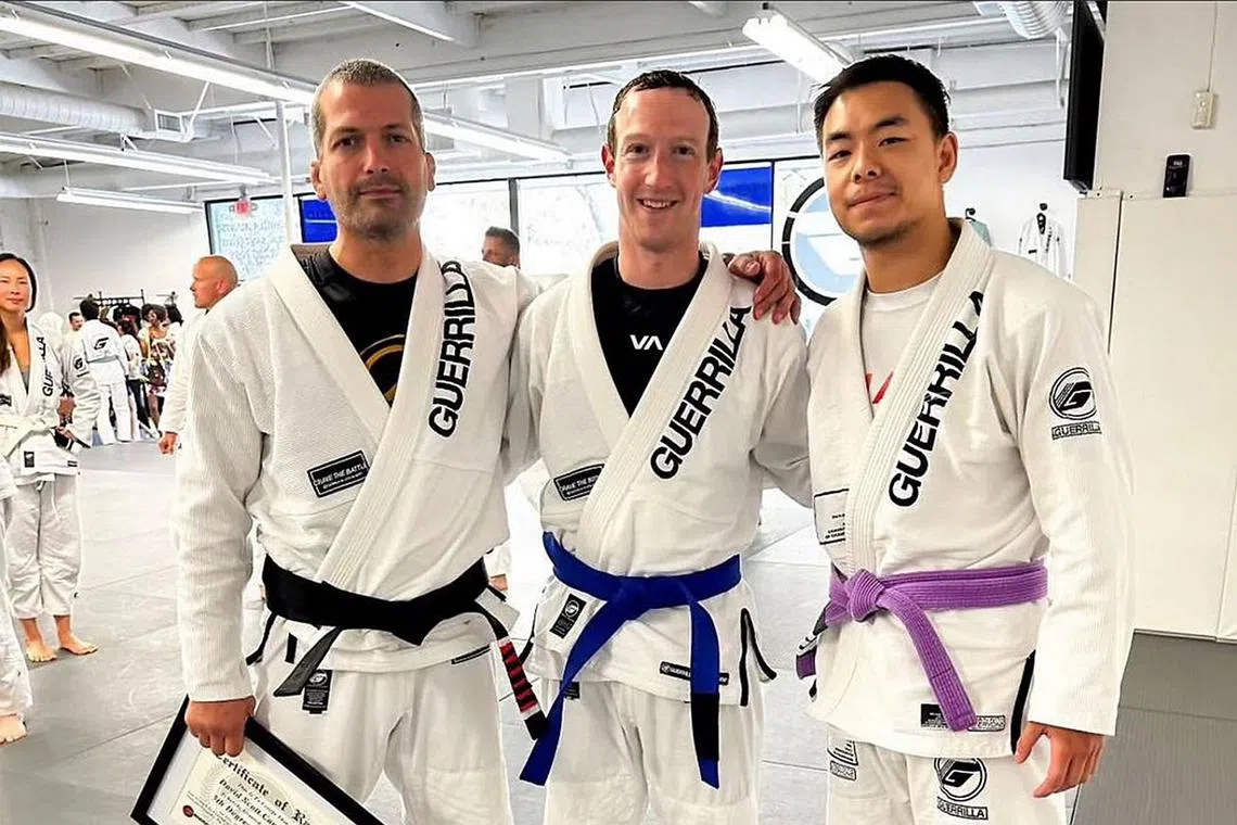 Khai Wu (right) with Mark Zuckerberg (centre) and Zuckerberg's coach Dave Camarillo.