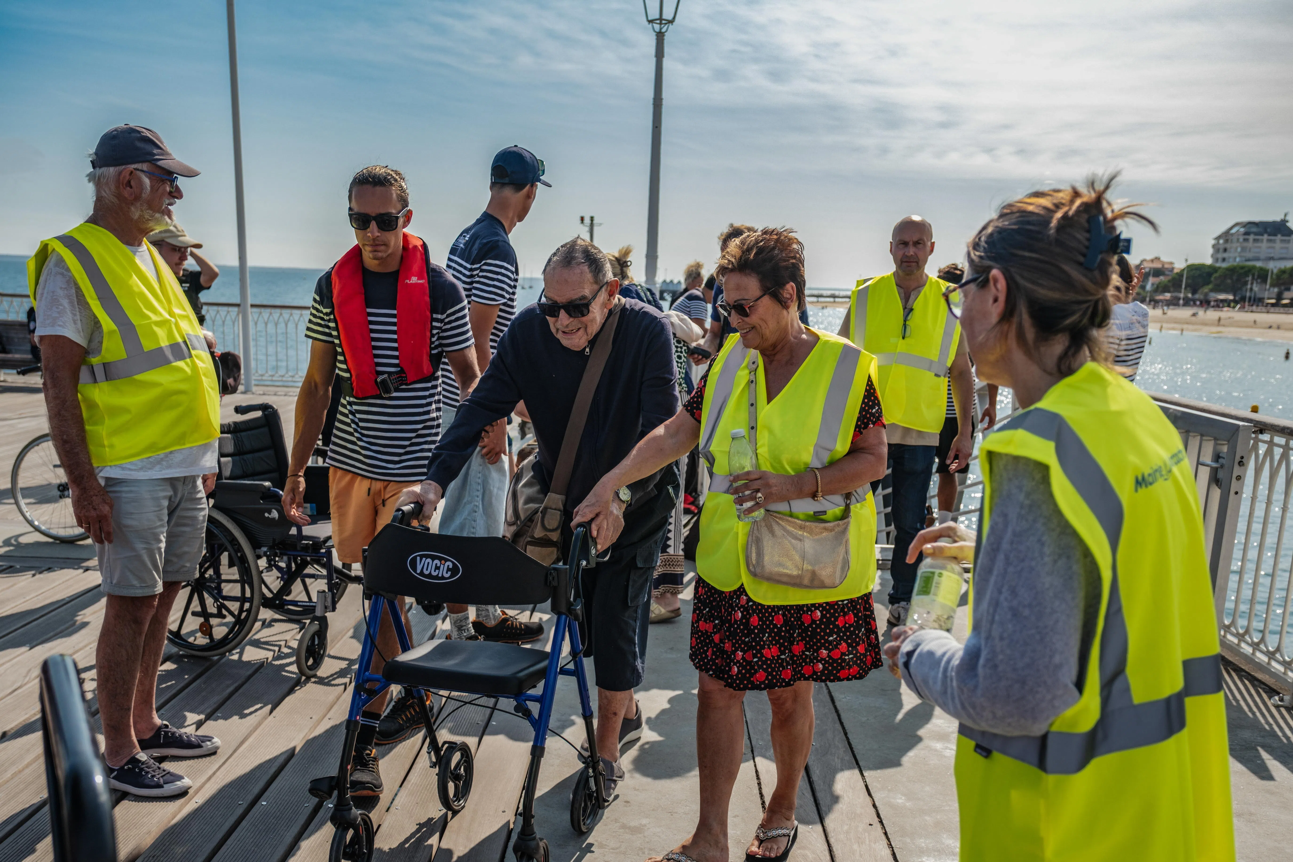 Tourists and residents arriving by boat in Arcachon, south-western France,  on July 24, after being evacuated from France’s Cap-Ferret peninsula.