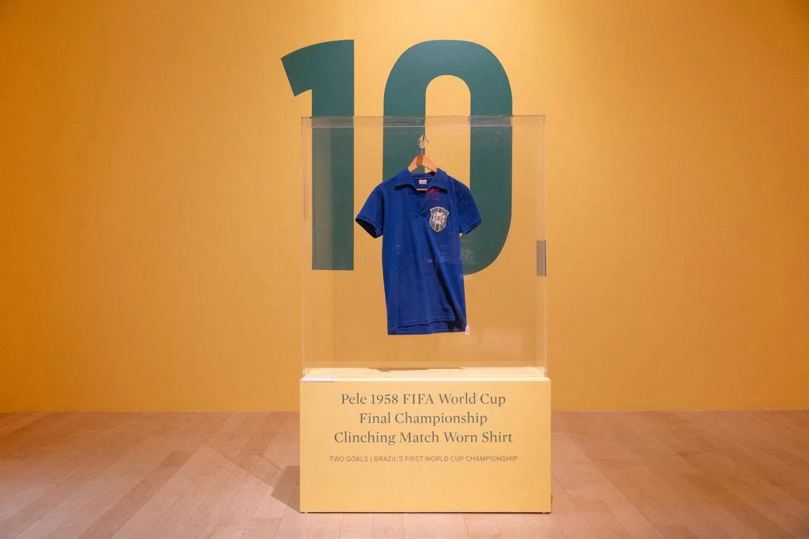 Brazil’s football legend Pele’s FIFA World Cup 1958 final jersey at Sotheby’s auction house in New York on July 1.