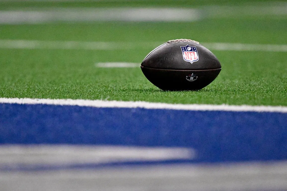 Jan 27, 2026; Frisco, TX, USA; A view of the NFL logo on a football at the goal line during the second half between the East and the West at the Ford Center at the Star. Mandatory Credit: Jerome Miron-Imagn Images