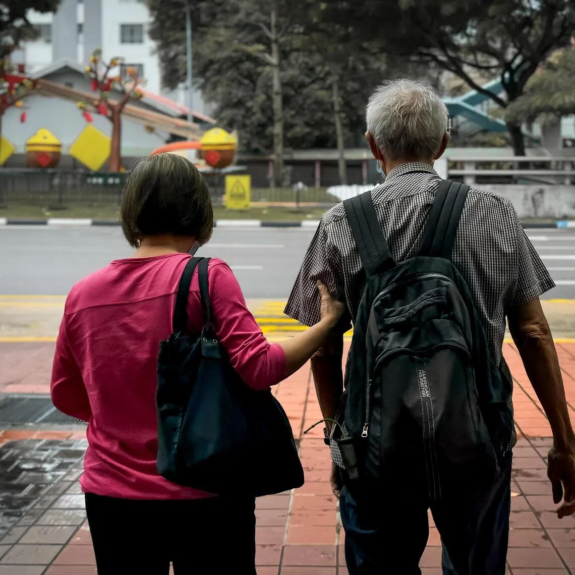 PIXGENERIC 
Generic Pictures. 

Elderly waiting for their bus at a bus stop on New Bridge Road, Jan 17, 2024. 

Old people, bus stop, Lunar New Year, CNY, LNY, dragon year,  tradition, traditional, culture, cultural, banner, poster, elderly, shoppers, red.