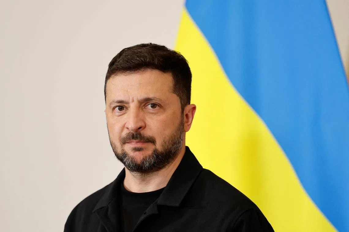 Ukrainian President Volodymyr Zelenskiy and Austrian Chancellor Christian Stocker (not pictured) attend a press conference, in Vienna, Austria June 16, 2025. REUTERS/Lisa Leutner