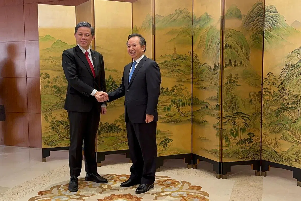 Minister-in-charge of the Public Service Chan Chun Sing (left) meeting Mr Li Ganjie, Minister of the Communist Party of China Central Committee Organisation Department, in Beijing on Sept 12.