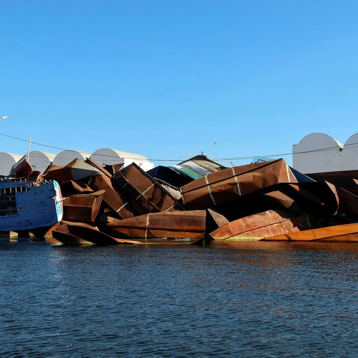 FILE PHOTO: A view shows boats that were used by migrants and seized by Tunisian coastguards, in Sfax, Tunisia April 26, 2023. REUTERS/Jihed Abidellaoui/File Photo