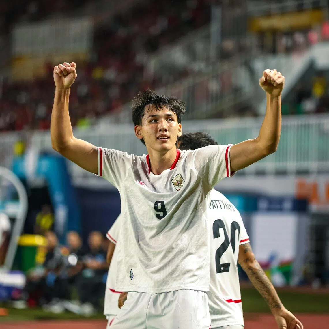 Indonesia’s Australia-born striker Mitchell Baker celebrates after scoring in the 5-1 ASEAN Championship Group A win over Cambodia on his international debut.