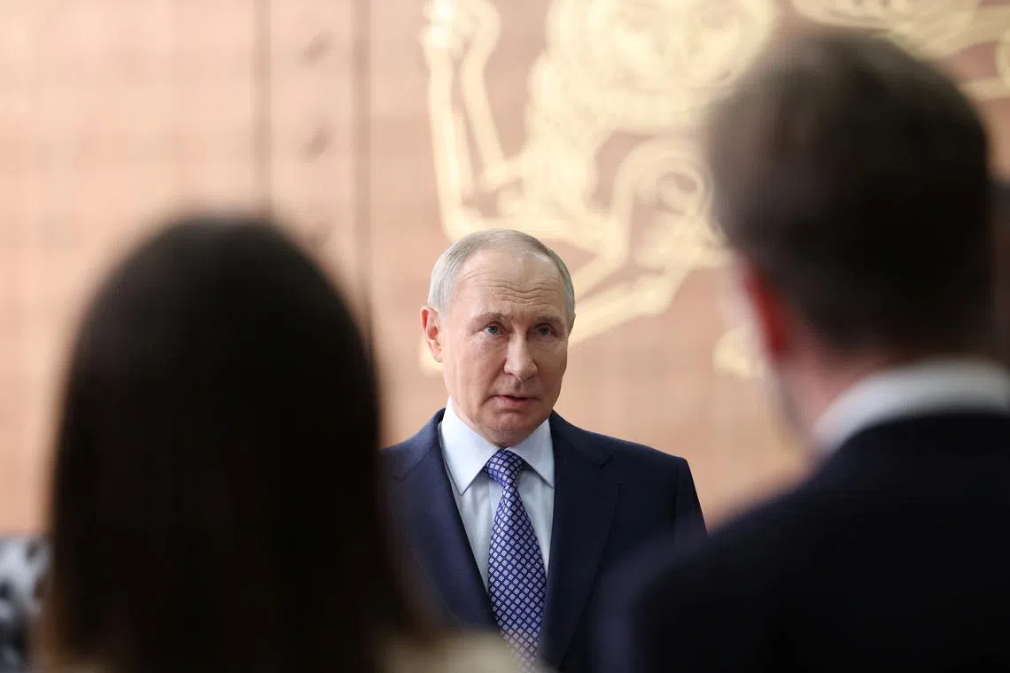 Russia's President Vladimir Putin speaks with journalists during a meeting in Moscow, Russia, April 21, 2025. Sputnik/Vyacheslav Prokofyev/Pool via REUTERS