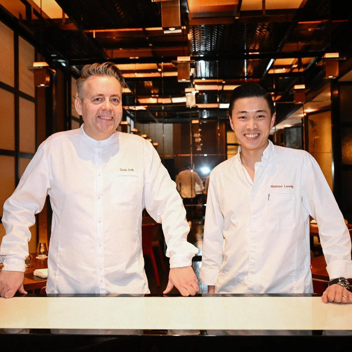 Chef Sven Erik Renaa (left) and Singaporean chef Mathew Leong (right) of three-Michelin-starred Re-naa (Norway) are in Singapore for a two-night collaboration with Chef Tetsuya Wakuda of Waku Ghin. 