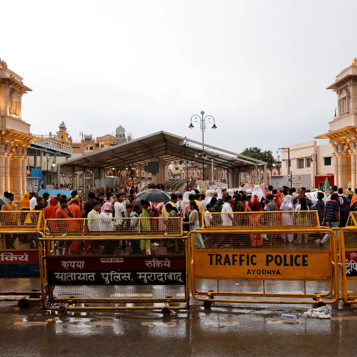 Hindu devotees wait to enter the Hindu god Lord Ram temple for prayers, in Ayodhya, in the northern state of Uttar Pradesh, India, June 6, 2024. REUTERS/Anushree Fadnavis