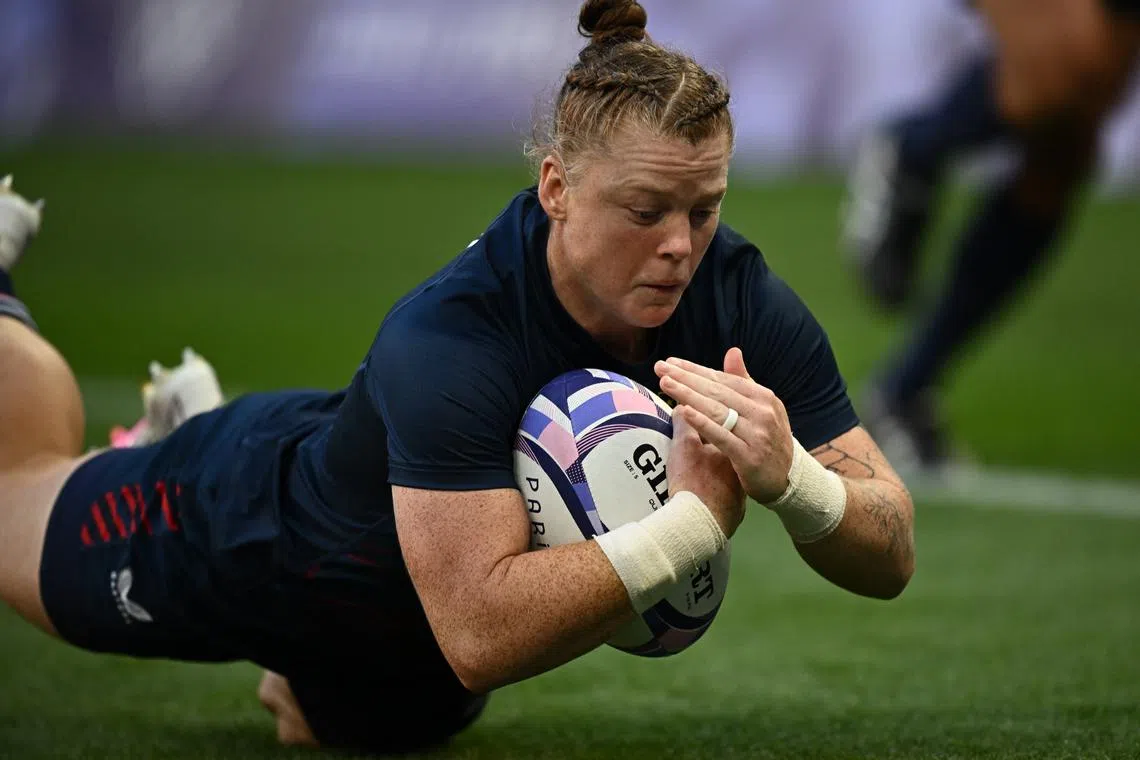 FILE PHOTO: Paris 2024 Olympics - Rugby Sevens - Women's Pool C - United States of America vs Brazil - Stade de France, Saint-Denis, France - July 28, 2024. Alev Kelter of United States scores a try REUTERS/Dylan Martinez/File Photo