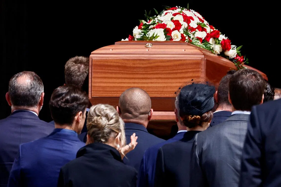 Pallbearers carry the coffin of former Italian prime minister Silvio Berlusconi, during his funeral in Milan.