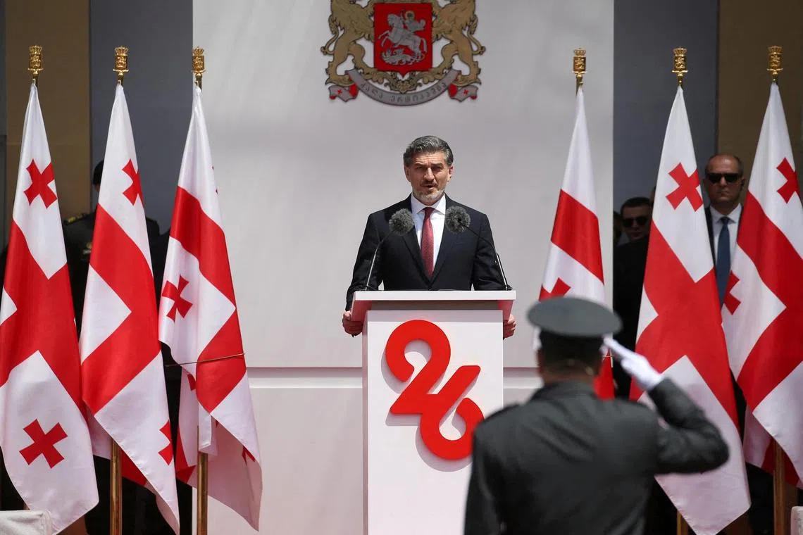 FILE PHOTO: Georgia's President Mikheil Kavelashvili delivers a speech during the Independence Day celebrations in Tbilisi, Georgia May 26, 2025. REUTERS/Irakli Gedenidze/Pool/File Photo