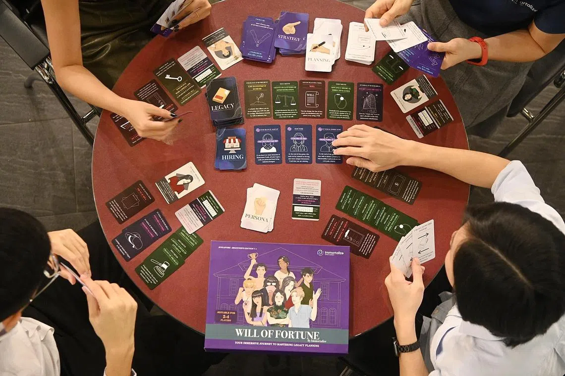 Upclose of players playing a card game ‘WILL OF FORTUNE’ by Immortalize on 6 June 2023 at Mochtar Riady Building, 15 Kent Ridge Drive. 





Four of our NUS Business School students, who are graduating this July, have developed an innovative solution to help society be more aware of and take early action to address the topic of end of life planning. This is especially important when we have an ageing population.

We discovered that this topic is often avoided or neglected by family members due to cultural and social barriers. For example, many people choose not to discuss the topic related to end of life as they either consider it a taboo or in denial. As a result, many individuals including caregivers are faced with multi-faceted problems related to palliative and hospice care, legal and financial planning, mental and emotional well-being related to the death of a loved one, funeral planning and self-care, amongst others.

Our Bachelor of Business Administration students embarked on this innovation journey as they had personally encountered or witnessed how families were negatively affected by end-of-life matters. One of them, Chiu Yu Xuan shared that when her grandmother was unexpectedly hit by Alzheimer’s disease which later led to a loss of mobility. His mother and aunties were suddenly thrust into a caregiver role which they were not familiar with. It was very distressing for them throughout the entire period as they were blindsided by issues related to the end of life. In retrospect, if the family had conversations on end-of-life planning earlier, they could have alleviated the burdens on the caregivers and maintained their dignity during the final stage of his grandmother’s life.

With a deep passion, the students conducted six months of research and ideation, as part of their final year project, to create a first-of-its-kind card game called the "Will of Fortune by Immortalize (‘WOFI)". The card game has been trialled with key members of the legacy planning industry, underscoring its authenticity.  It will be officially launched in July 2023, with the support of a Singapore start-up, known as Immortalize, an online elderhood marketplace and information provider.

To make the game engaging, the students created a unique backstory centred around Peter Devan, the game’s persona, who was running out of time and sought the assistance of the players. Through the game, players will learn about the importance of end-of-life planning and the critical decisions that must be made to ensure a fulfilling and secure legacy. With an immersive and enjoyable gaming experience, it can eliminate negative connotations and emotions often attached to topics concerning end-of-life.