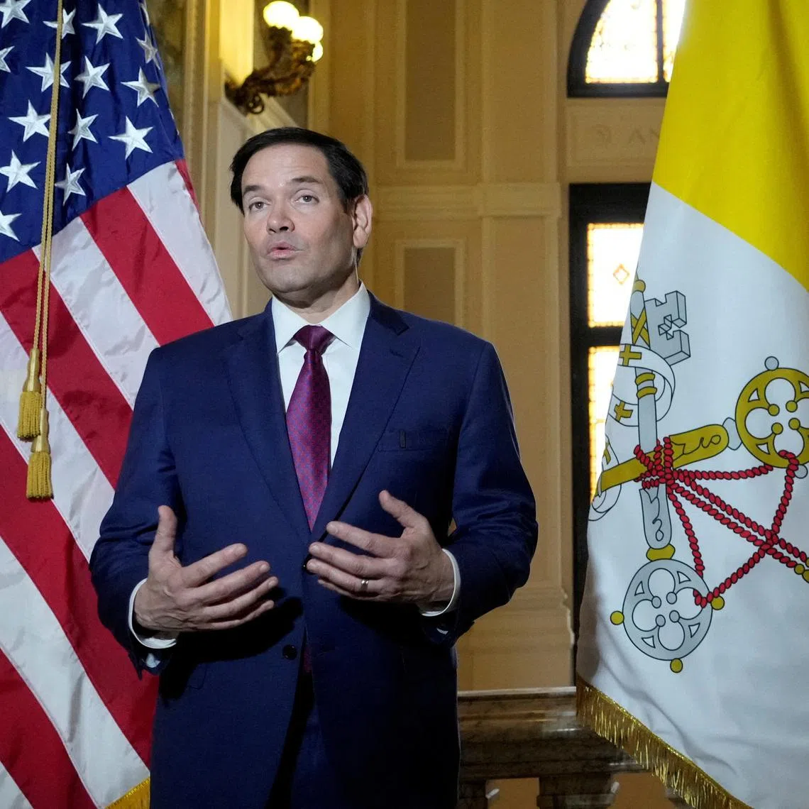 FILE PHOTO: Secretary of State Marco Rubio, speaks to the media during a meeting with President of the Conference of Italian Bishops, Cardinal Matteo Zuppi at the U.S. Embassy to the Holy See in Rome, Saturday, May 17, 2025. Gregorio Borgia/Pool via REUTERS/File Photo