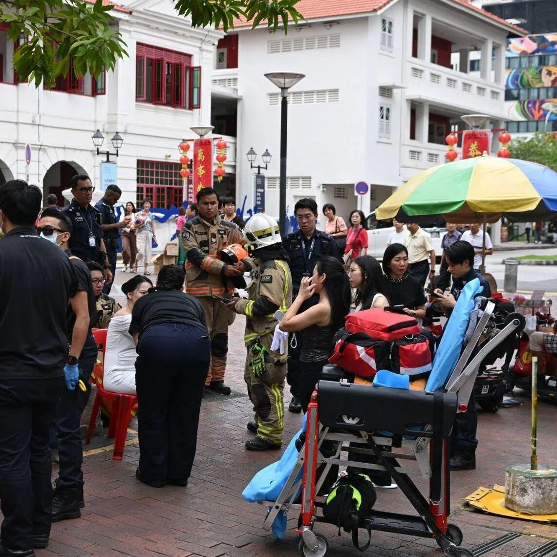 People have been evacuated from the premises and were sitting near the Stamford Arts Centre on Waterloo Street on March 13..