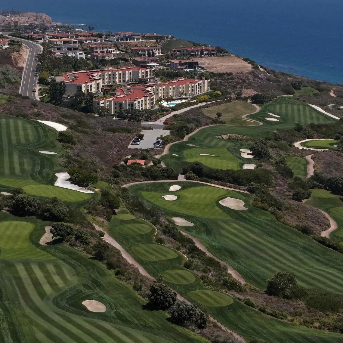The man as reportedly seen taking photos of the Trump National Golf Club and observing security preparations.