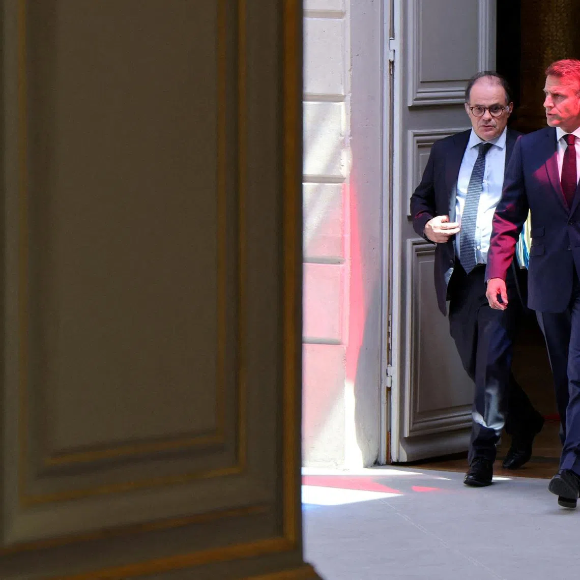 FILE PHOTO: Secretary General of the French Presidency Emmanuel Moulin walks with France's President Emmanuel Macron as they attend a summit on New Caledonia at the Elysee Palace in Paris on July 2, 2025. LUDOVIC MARIN/Pool via REUTERS/File Photo