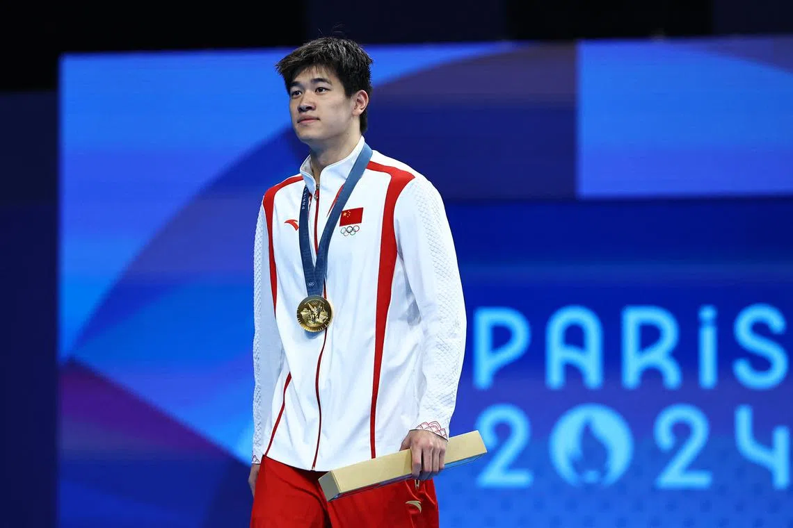 FILE PHOTO: Paris 2024 Olympics - Swimming - Women's 100m Freestyle Victory Ceremony - Paris La Defense Arena, Nanterre, France - July 31, 2024. Gold medallist Zhanle Pan of China celebrates after winning and establishing World record. REUTERS/Evgenia Novozhenina/File Photo
