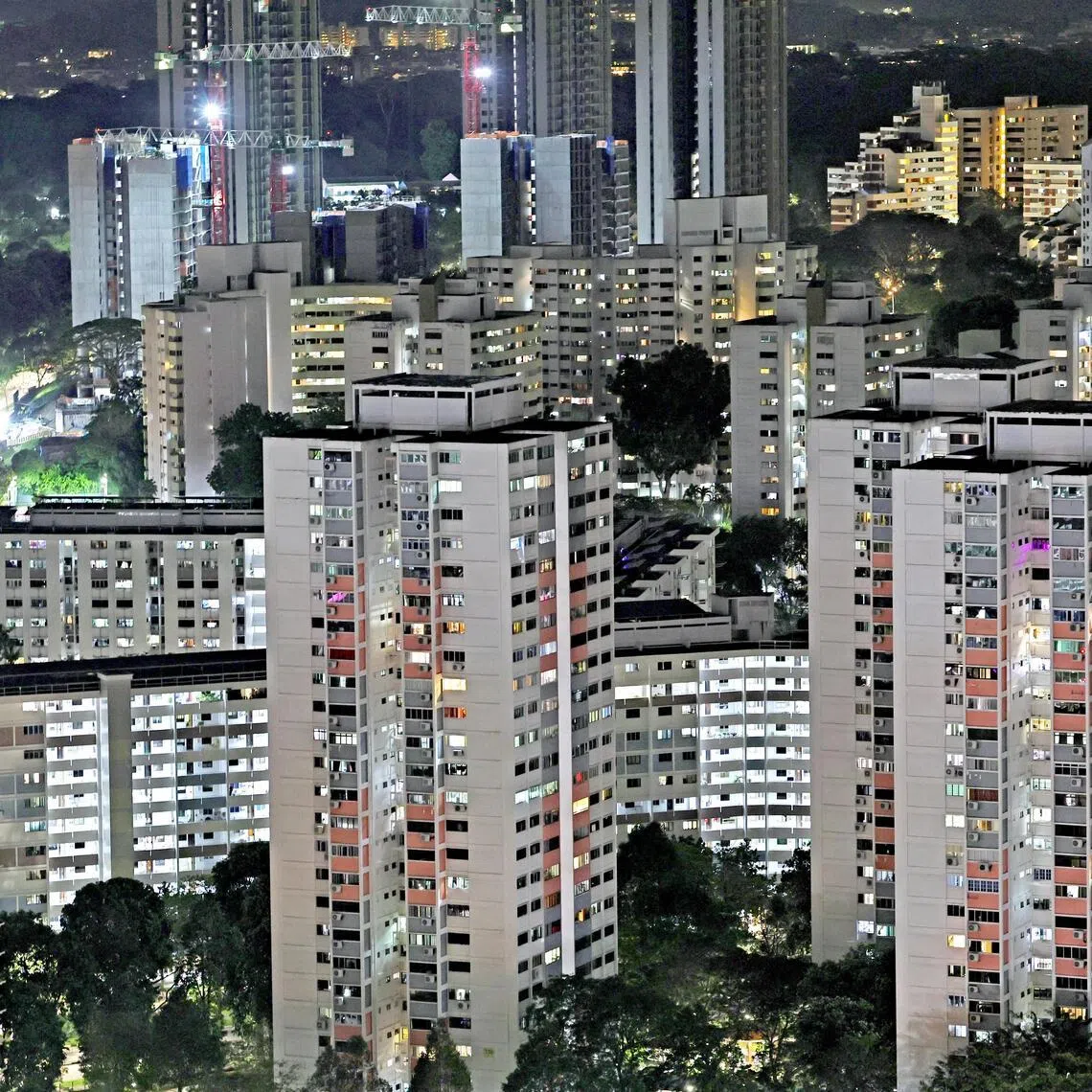 pixgeneric/ pix of public housing (HDB) and privates and office buildings seen from Clementi area on the night of Mar 3, 2026. //

Can be used for stories about electricity, tariffs, taxes, cost, inflation, rebates,on sustainability and ESG, electricity tariff, inflation and climate resilience. energy, energy market,CDC vouchers , vouchers, rebates, PUB, housing policies, resales, HDB, 