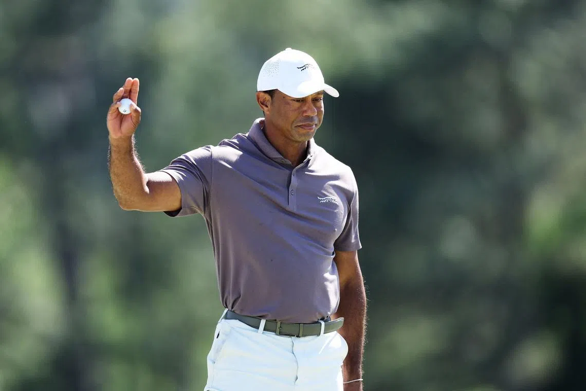 Tiger Woods reacts on the 18th green during the second round of the 2024 Masters.