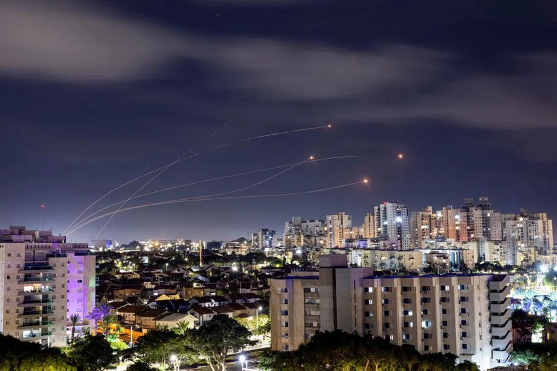 Israel's Iron Dome anti-missile system intercepts rockets launched from the Gaza Strip, as seen from Ashkelon, in southern Israel, October 15, 2023. REUTERS/Amir Cohen