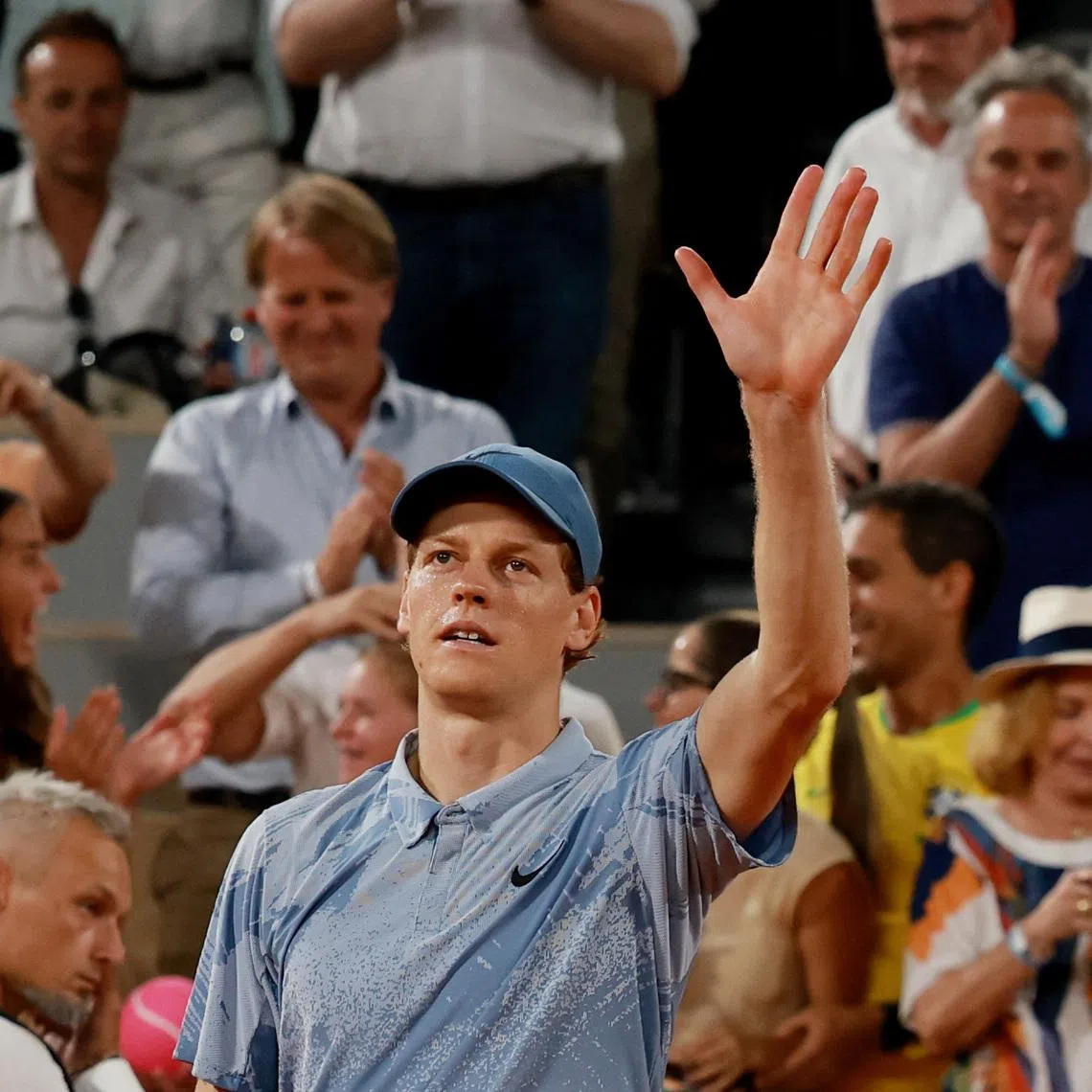 Italy's Jannik Sinner celebrates after winning his first round match against France's Clement Tabur.