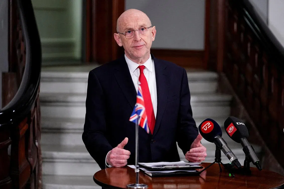 FILE PHOTO: British Defense Minister John Healey and Danish Defense Minister Troels Lund Poulsen (not pcitured) attend a press conference at the Ministry of Defense in Copenhagen, January 21, 2026. Thomas Traasdahl/Ritzau Scanpix/via REUTERS/File Photo