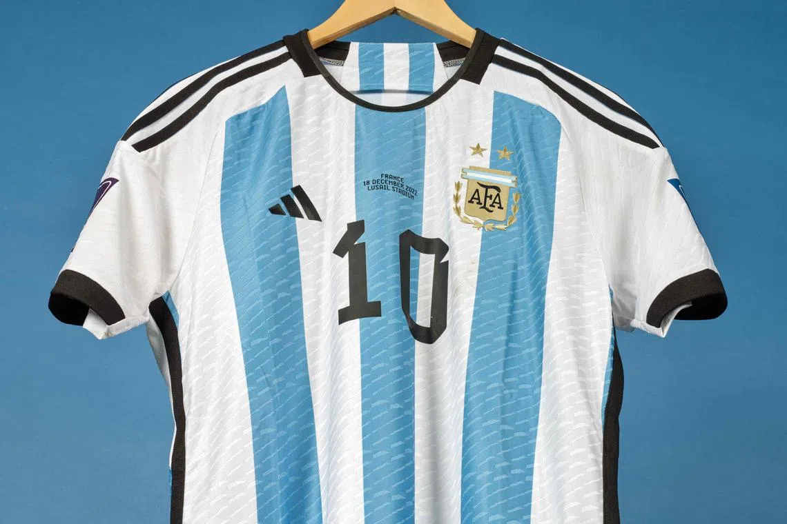 Lionel Messi's jersey which was worn during the 2022 World Cup final against France is among six that will be auctioned in December. 