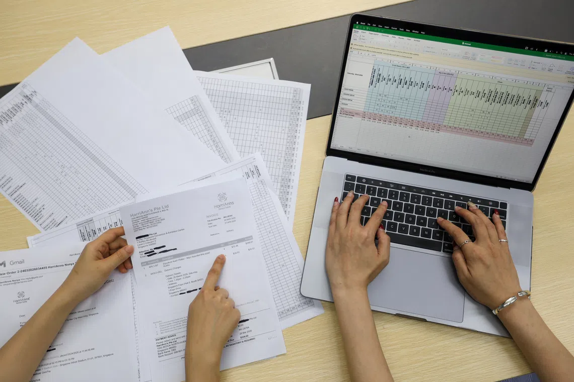 HarriAnns Nonya Table’s staff manually compiling orders through a spreadsheet at their central kitchen at JTC Bedok Food City on April 9, 2026.