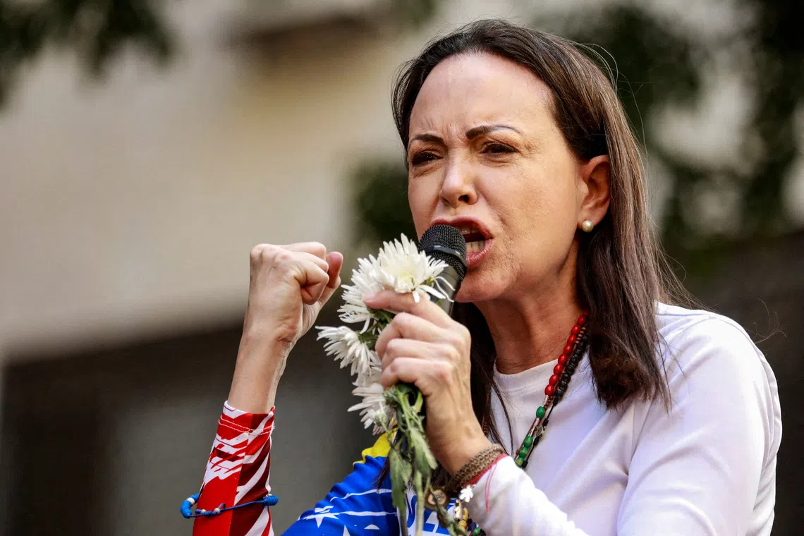 FILE PHOTO: Venezuelan opposition leader Maria Corina Machado addresses supporters at a protest ahead of the Friday inauguration of President Nicolas Maduro for his third term, in Caracas, Venezuela January 9, 2025. REUTERS/Leonardo Fernandez Viloria/File Photo